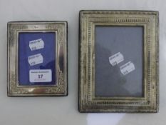 Two silver photograph frames