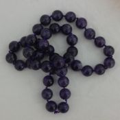 A string of amethyst beads