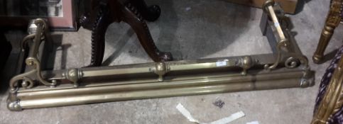 Two Victorian brass fenders