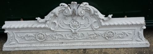 A Victorian white painted scroll carved and gesso cresting