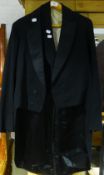 An Edwardian waistcoat and butlers coat