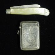 A silver vesta and a mother-of-pearl folding fruit knife