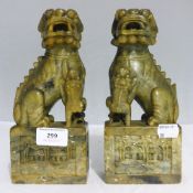 A pair of soapstone dogs-of-fo