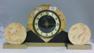 An Art Deco clock garniture