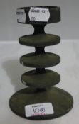 A Robin Welch modernist cast metal candlestick, as selected for the Design Centre,