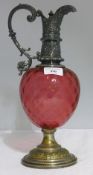 A silver plate mounted cranberry ewer