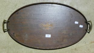 An inlaid mahogany tray