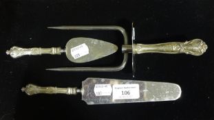 Three silver handled servers