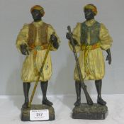 Two cold painted spelter figures modelled as North African gentlemen - WITHDRAWN