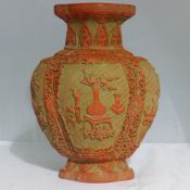 A Chinese red ground vase