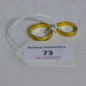 Two 22 ct gold wedding bands (8 grammes all in)