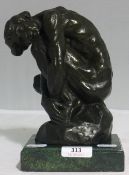 A bronze of an abstract man