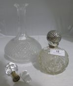 A silver top dressing table bottle together with a silver mounted decanter