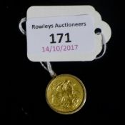 A Victorian gold sovereign in a 9 ct gold frame,