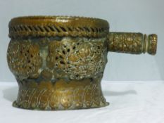 An Eastern copper handled pot