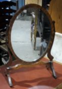 A mahogany dressing table mirror