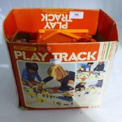 A quantity of vintage matchbox cars and track