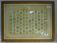 A framed and glazed print of military badges