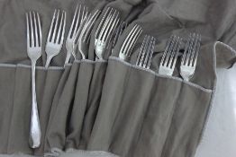 Six matched early 19th century silver table forks,