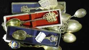 A quantity of silver souvenir spoons