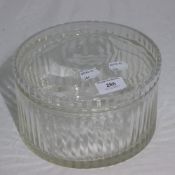A round cut glass box and cover