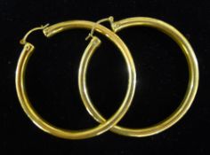 A pair of 9 ct gold hoop earrings