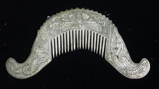 A Chinese white metal comb