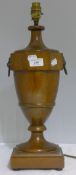 A mahogany urn form table lamp