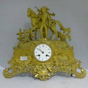 A 19th century gilt metal cased figural mounted mantle clock