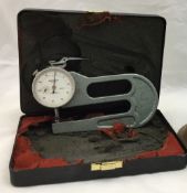 A cased paper gauge
