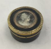An unmarked gold mounted tortoiseshell pill box