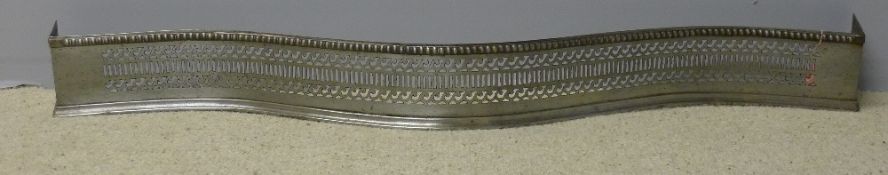 A 19th century polished steel fender,