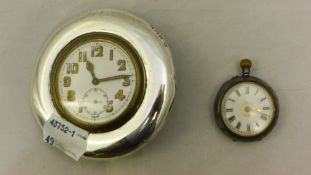 A silver cased ladies pocket watch and a silver framed timepiece