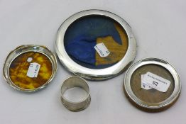 Two silver photograph frames, etc.