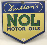 A Duckham's NOL Motor Oils enamel advertising sign