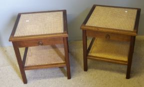 A pair of modern caned side tables