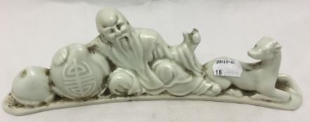 A Chinese porcelain brush rest