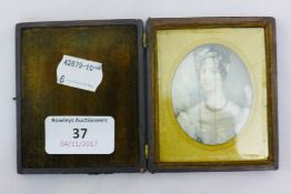 A cased 19th century miniature portrait