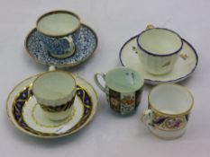 Two Worcester cups and saucers, a Crown Derby cup,