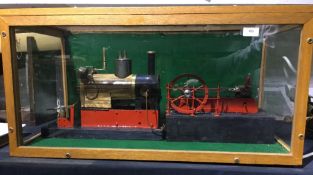 A glazed cased stationary engine