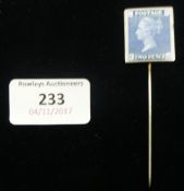 An enamel Victorian postage stamp stickpin