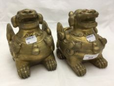 A pair of Chinese brass dragons