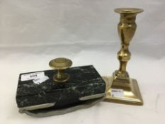 A marble blotter and a candlestick