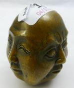 A miniature four faced Buddha head