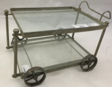 A small plated table trolley