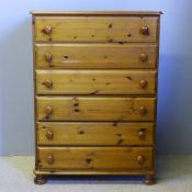 A modern pine chest of drawers