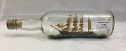 A vintage sailing ship in a bottle