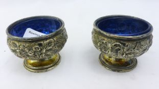 A pair of silver salts with blue liner