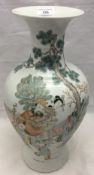 A Chinese white vase decorated with figures
