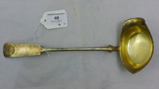 A silver ladle